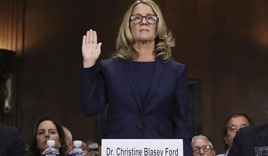 Christine Blasey Ford is sworn in before the Senate Judiciary Committee on Capitol Hill in Washington on Thursday, Sept. 27, 2018. (Win McNamee/Pool Photo via AP)