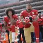 FILE - In this Oct. 2, 2016, file photo, San Francisco 49ers quarterback Colin Kaepernick, left, and safety Eric Reid kneel during the national anthem before an NFL football game against the Dallas Cowboys in Santa Clara, Calif. The Carolina Panthers have signed the free agent safety to a one-year contract. Terms of the deal were not announced Thursday, Sept. 27, 2018. (AP Photo/Marcio Jose Sanchez, File) **FILE**