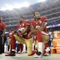 FILE - In this Sept. 12, 2016, file photo, San Francisco 49ers safety Eric Reid (35) and quarterback Colin Kaepernick (7) kneel during the national anthem before an NFL football game against the Los Angeles Rams in Santa Clara, Calif. The Carolina Panthers have signed free agent safety Eric Reid to a one-year contract. Terms of the deal were not announced Thursday, Sept. 27, 2018.  (AP Photo/Marcio Jose Sanchez, File)