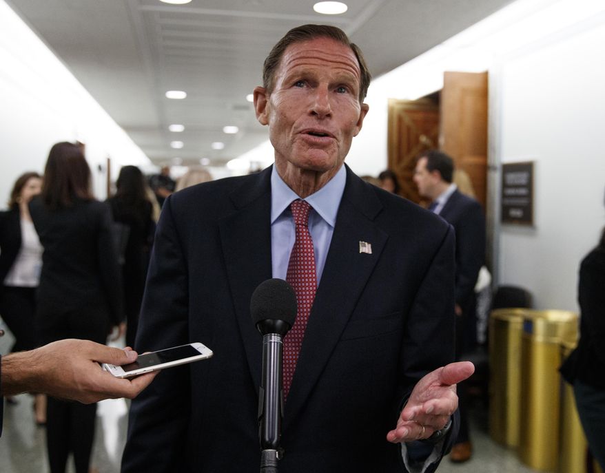 Sen. Richard Blumenthal, D-Conn., speaks to media during a break in a Senate Judiciary Committee hearing on Capitol Hill in Washington, Thursday, Sept. 27, 2018, with Christine Blasey Ford and Supreme Court nominee Brett Kavanaugh. (AP Photo/Carolyn Kaster) ** FILE **