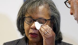 Anita Hill wipes her eye after speaking at the University of Utah Wednesday, Sept. 26, 2018, in Salt Lake City. Hill has been back in the spotlight since Christine Blasey Ford accused Supreme Court nominee Brett Kavanaugh of sexually assaulting her when the two were in high school. Hill&#39;s 1991 testimony against Clarence Thomas riveted the nation. Thomas was confirmed anyway, but the hearing ushered in a new awareness of sexual harassment. (AP Photo/Rick Bowmer)