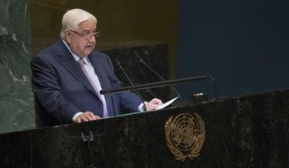 CORRECTS NAME OF SYRIAN DEPUTY PRIME MINISTER TO WALID AL-MOALLEM -  Syrian Deputy Prime Minister Walid al-Moallem addresses the 73rd session of the United Nations General Assembly, Saturday, Sept. 29, 2018 at U.N. headquarters. (AP Photo/Mary Altaffer)