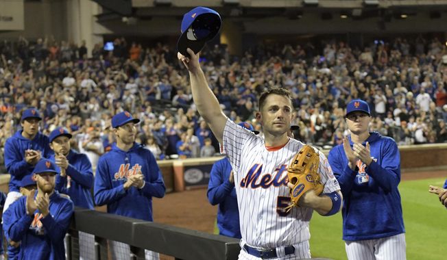 New York Mets third baseman David Wright (5) acknowledges the fans as he leaves the field after coming out of a baseball game during the fifth inning against the Miami Marlins, Saturday, Sept. 29, 2018, in New York. (AP Photo/Bill Kostroun)