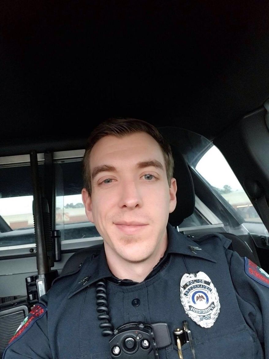 This photo provided by the Mississippi Department of Public Safety shows Brookhaven patrolman Cpl. Zach Moak. Patrolman James White, 35; and Moak, 31 were shot and killed following an early Saturday, Sept. 29, 2018 confrontation authorities said. Warren Strain of the Mississippi Department of Public Safety said at a news conference that the officers were called to a house in the city of Brookhaven at about 5 a.m. for a report of shots fired. (Mississippi Department of Public Safety via AP)