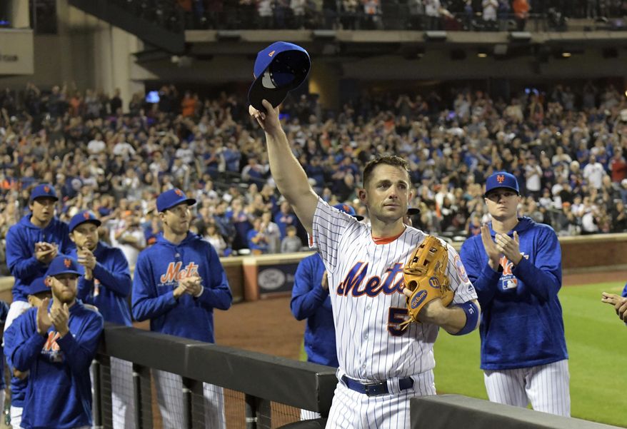 New York Mets third baseman David Wright (5) acknowledges the fans as he leaves the field after coming out of a baseball game during the fifth inning against the Miami Marlins, Saturday, Sept. 29, 2018, in New York. (AP Photo/Bill Kostroun)