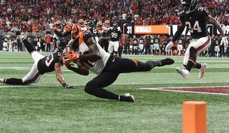 Cincinnati Bengals wide receiver A.J. Green (18) makes a touchdown catch against the Atlanta Falcons during the second half of an NFL football game, Sunday, Sept. 30, 2018, in Atlanta. The Cincinnati Bengals won 37-36. (AP Photo/John Amis)