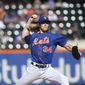 New York Mets&#39; Noah Syndergaard delivers a pitch during the first inning of a baseball game against the Miami Marlins, Sunday, Sept. 30, 2018, in New York. (AP Photo/Jason DeCrow)