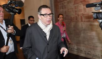 In this Sept. 19, 2018, file photo, Jean-Claude Arnault arrives at the district court for the start of court proceedings in Stockholm. Arnault, a French citizen who is a major cultural figure in Sweden, is at the center of a sex-abuse and financial crimes scandal that has tarnished the academy and forced it to take a year off in choosing who should get the prestigious literature prize. (Fredrik Sandberg/TT News Agency via AP, File)