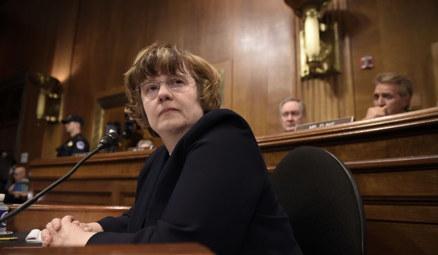 In this Thursday, Sept. 27, 2018, photo, Rachel Mitchell, a prosecutor from Arizona, waits for Christine Blasey Ford, the woman accusing Supreme Court nominee Brett Kavanaugh of sexually assaulting her, to testify before the U.S. Senate Judiciary Committee on Capitol Hill in Washington. (Saul Loeb/Pool Photo via AP)