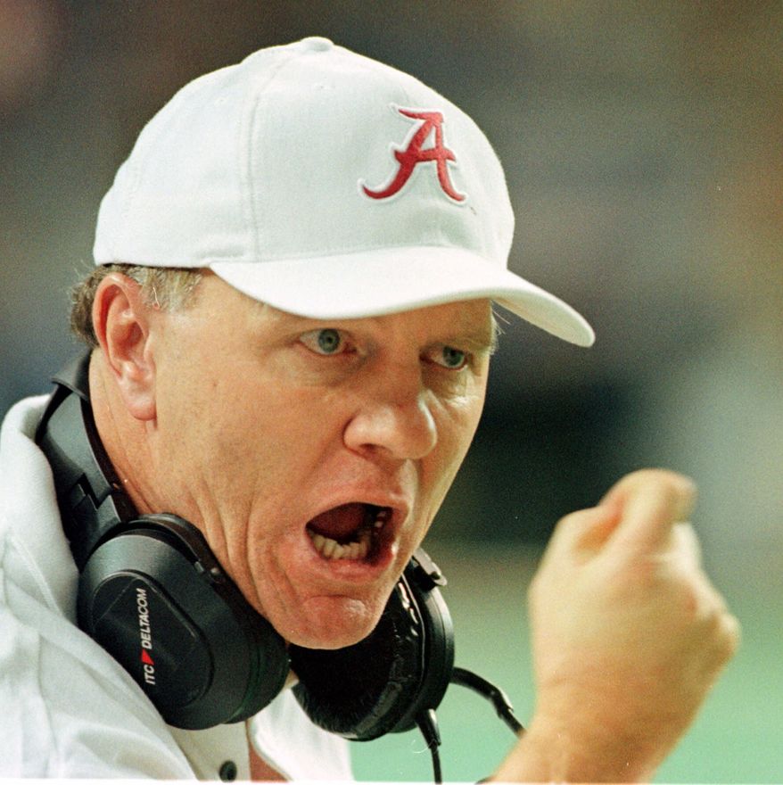 Alabama head coach Mike DuBose yells from the sidelines as the Crimson Tide plays Florida in the SEC Championship Saturday, Dec. 4, 1999, at the Georgia Dome. (AP Photo/Curtis Compton)
