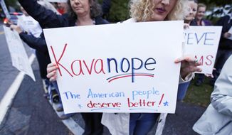 Protesters demonstrate outside a political event hosting U.S. Sen. Jeff Flake, R-Arizona, in Manchester, N.H., Monday, Oct. 1, 2018. Flake, days after a critical vote in support of Supreme Court nominee Brett Kavanaugh, made his second visit this year to New Hampshire. The visit will once again stoke suggestions that he might run against President Trump in 2020. (AP Photo/Charles Krupa)