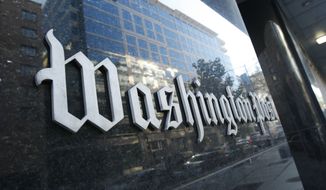 In this Oct. 31, 2008, file photo, the Washington Post building is seen in Washington. The Washington Post Co. said Wednesday, Feb. 24, 2010, its fourth-quarter profit more than quadrupled. Its cable TV and education divisions provided most of the lift, although the publishing segment also made money after large cost cuts.(AP Photo/Gerald Herbert, File)