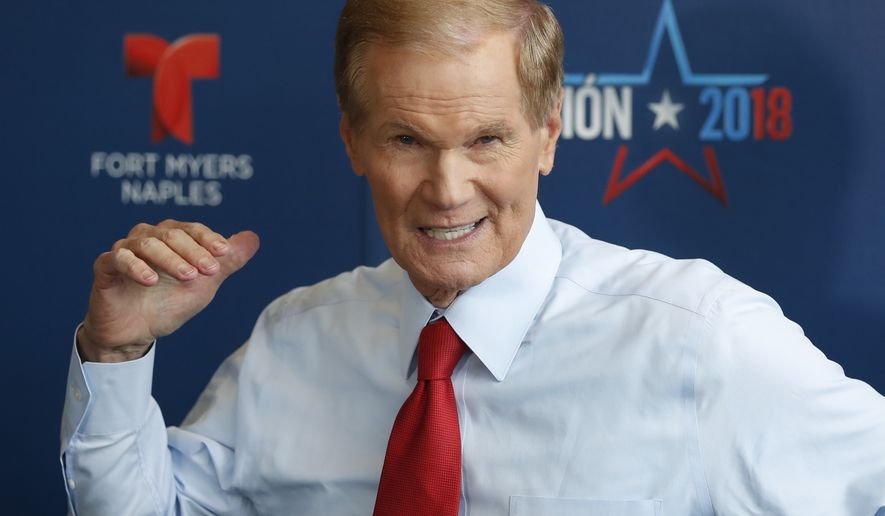 Incumbent Democratic Sen. Bill Nelson speaks to members of the media after a debate with Republican challenger Rick Scott, who is Florida&#x27;s governor, in their campaign for a highly competitive U.S. Senate seat, Tuesday, Oct. 2, 2018, in Miramar, Fla. (AP Photo/Wilfredo Lee)