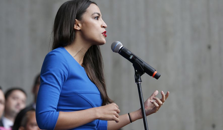 Alexandria Ocasio-Cortez, democratic candidate for the 14th Congressional District of New York, speaks during a rally against Judge Brett Kavanaugh at City Hall, Monday, Oct. 1, 2018, in Boston. (AP Photo/Mary Schwalm) ** FILE **