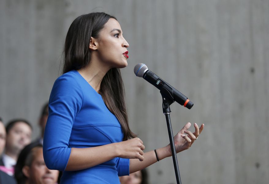 Alexandria Ocasio-Cortez, democratic candidate for the 14th Congressional District of New York, speaks during a rally against Judge Brett Kavanaugh at City Hall, Monday, Oct. 1, 2018, in Boston. (AP Photo/Mary Schwalm) ** FILE **
