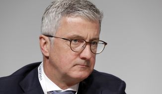 FILE - In this Thursday, May 3, 2018 file photo, Rupert Stadler, CEO of Audi AG, attends the shareholders&#39; meeting of the Volkswagen stock company in Berlin, Germany. German carmaker Volkswagen said Tuesday, Oct. 2, 2018 that suspended Audi CEO Rupert Stadler is leaving the company, more than three months after he was arrested as part of a probe into parent company Volkswagen’s manipulation of diesel emissions controls. (AP Photo/Michael Sohn, file)