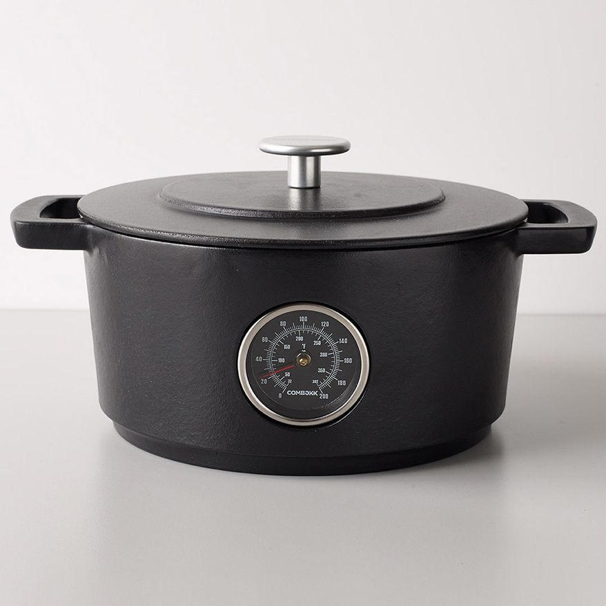 This photo provided by the MoMA Design Store shows the Railway Dutch Oven. Available at the Museum of Modern Art's store, and made in Holland of recycled iron tracks, the Railway Dutch Oven has a handy thermometer built in to help monitor the cooking progress. (MoMA Design Store via AP)