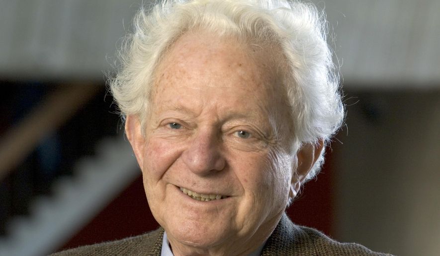 FILE - In this Nov. 2014, file photo provided by Fermilab, Physics Nobel Prize winner Dr. Leon M. Lederman poses for a photo in Batavia, Ill. Lederman, an experimental physicist who won a Nobel Prize in physics for his work on subatomic particles and coined the phrase "God particle," has died. Ellen Carr Lederman, his wife of 37 years, said her husband died Wednesday, Oct. 3, 2018, at a nursing home in the Idaho town of Rexburg. He was 96. (Reidar Hahn, Fermilab via AP, file)