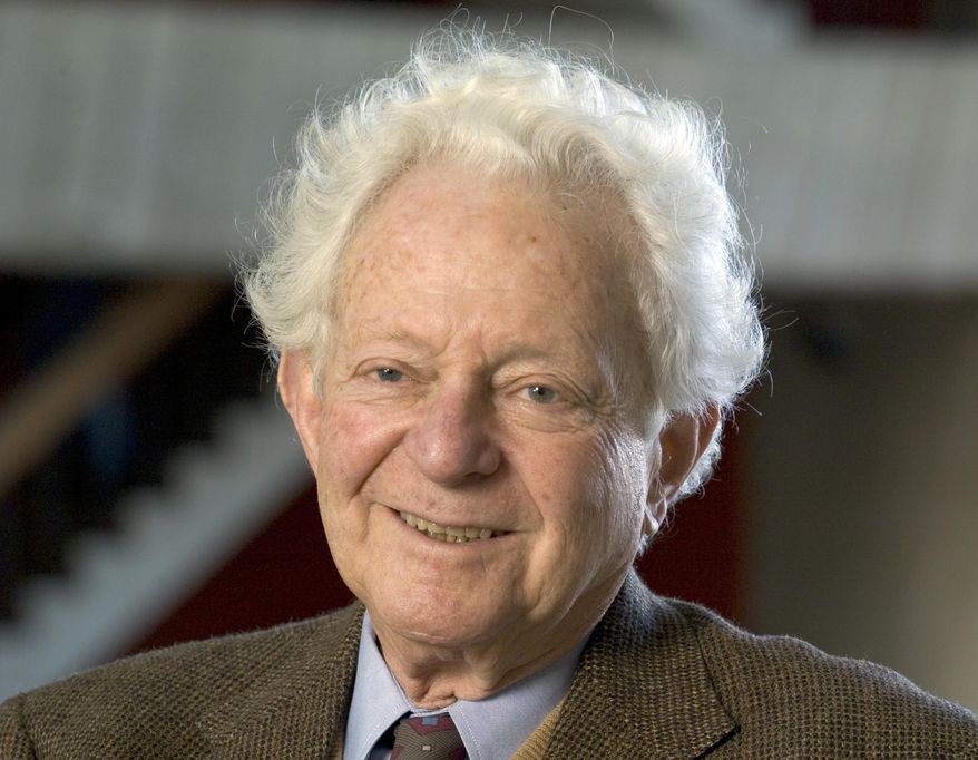 FILE - In this Nov. 2014, file photo provided by Fermilab, Physics Nobel Prize winner Dr. Leon M. Lederman poses for a photo in Batavia, Ill. Lederman, an experimental physicist who won a Nobel Prize in physics for his work on subatomic particles and coined the phrase "God particle," has died. Ellen Carr Lederman, his wife of 37 years, said her husband died Wednesday, Oct. 3, 2018, at a nursing home in the Idaho town of Rexburg. He was 96. (Reidar Hahn, Fermilab via AP, file)