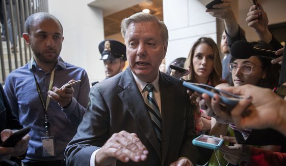 Sen. Lindsey Graham, R-S.C., a member of the Senate Judiciary Committee, responds to reporters outside a secure underground room in the Capitol where senators are being briefed on a new FBI background file on sexual allegations that have been made against Supreme Court nominee Brett Kavanaugh, in Washington, Wednesday, Oct. 3, 2018. (AP Photo/J. Scott Applewhite) ** FILE **