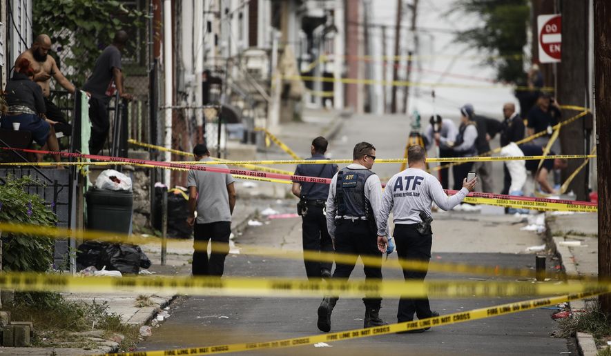 FILE - In this Monday, Oct. 1, 2018 file photo, authorities investigate the scene of Saturday's fatal car explosion in Allentown, Pa. Officials with the federal Bureau of Alcohol, Tobacco, Firearms and Explosives are holding a news conference Thursday, Oct. 4 with prosecutors and Allentown police.(AP Photo/Matt Rourke, File)