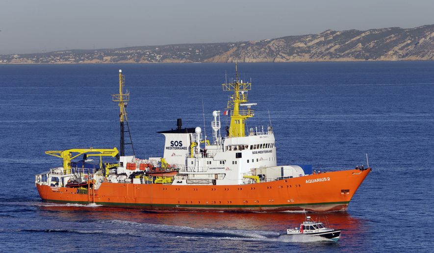 The Aquarius arrives at Marseille port, southern France, Thursday, Oct.4, 2018. Humanitarian group SOS Mediterranee said Thursday the Aquarius is making a stopover while waiting for a new flag and is "determined to go back to sea as soon as possible." The group urged European government to find a new flag for the vessel to secure its future after Panama's maritime authority removed the registration of the boat. (AP Photo/Claude Paris)