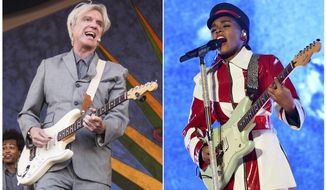 This combination photo shows David Byrne performing at the New Orleans Jazz and Heritage Festival in New Orleans on April 29, 2018, left, and Janelle Monae performing in Los Angeles on June 28, 2018. Byrne ends each show on a serious note calling attention to minority victims of violence by covering Janelle Monae&#x27;s &amp;quot;Hell You Talmbout.&amp;quot; Monae says she was touched by the gesture, and believes the song&#x27;s message needs to be heard by every audience. (AP Photo)