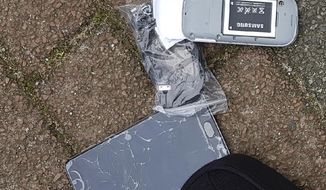 In this image released by the Dutch Defense Ministry on Thursday Oct. 4, 2018, one of the many phones belonging to four Russian officers of the Main Directorate of the General Staff of the Armed Forces of the Russian Federation, GRU, is seen after one of the four officers tried to destroy it when they were caught on April 13, 2018. The officers were expelled from the Netherlands for allegedly trying to hack into the chemical watchdog OPCW&#x27;s network. The Dutch defense minister on Thursday Oct. 4, 2018, accused Russia&#x27;s military intelligence unit of attempted cybercrimes targeting the U.N. chemical weapons watchdog and the investigation into the 2014 Malaysian Airlines crash over Ukraine. (Dutch Defense Ministry via AP)