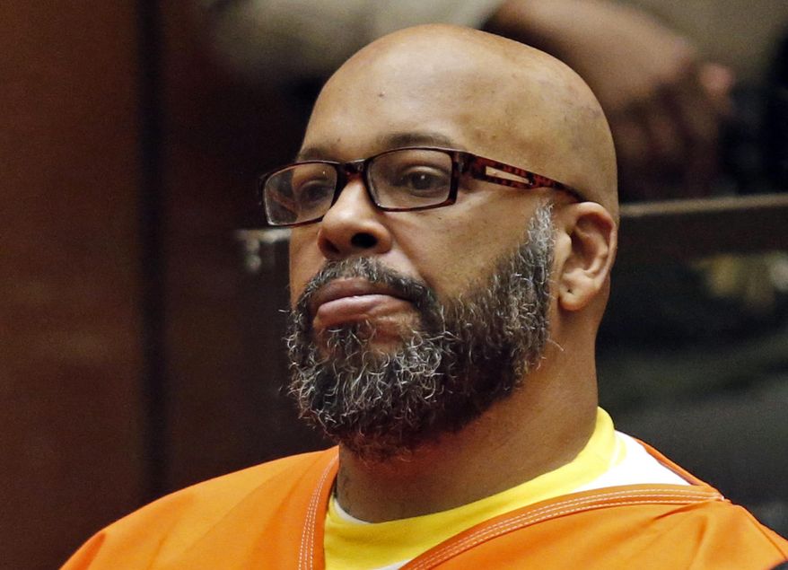 In this July 7, 2015, file photo, Marion Hugh "Suge" Knight sits for a hearing in his murder case in Superior Court in Los Angeles. Former rap mogul Knight is expected to be sentenced to nearly three decades in prison in a Los Angeles court. The hearing Thursday, Oct. 4, 2018, for the 53-year-old Death Row Records co-founder comes almost four years after Knight killed one man and injured another with his truck outside a Compton burger stand. (Patrick T. Fallon/Pool Photo via AP, File)