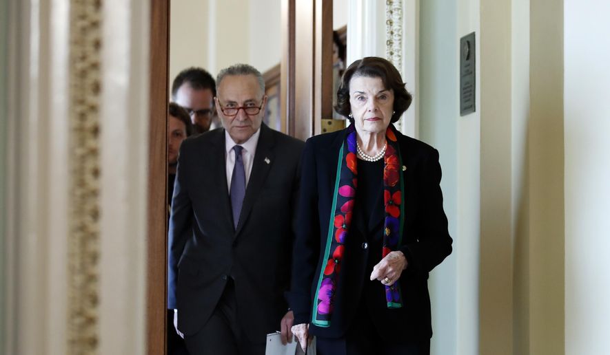 Senate Minority Leader Chuck Schumer, D-N.Y., left, and Senate Judiciary Committee Ranking Member Sen. Dianne Feinstein, D-Calif., arrive to speak to the media about the FBI report on sexual misconduct allegations against Supreme Court nominee Brett Kavanaugh, on Capitol Hill, Thursday, Oct. 4, 2018 in Washington. (AP Photo/Alex Brandon)