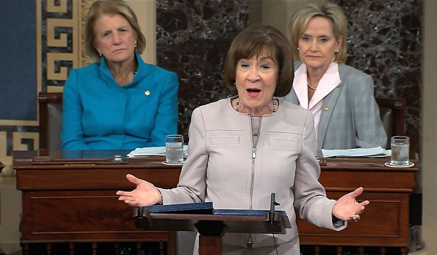 In this image from video provided by Senate TV, Sen. Susan Collins, R-Maine., speaks on the Senate floor about her vote on Supreme Court nominee Judge Brett Kananaugh, Friday, Oct. 5, 2018 in the Capitol in Washington.  Sen Shelly Capito, R-W.Va., sits rear left and Sen. Cindy Hyde-Smith, R-Miss., sits right.  (Senate TV via AP) ** FILE **