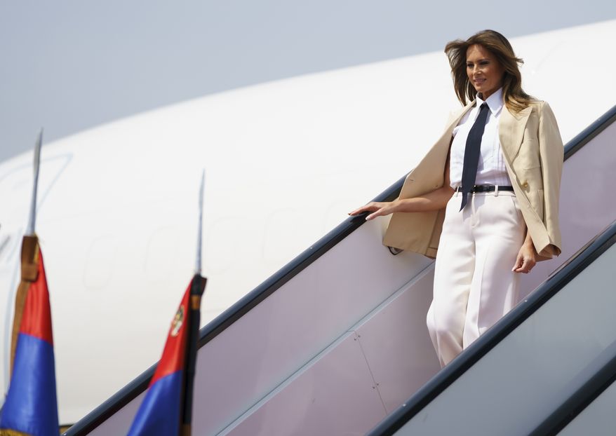 First lady Melania Trump is greeted by Egyptian first lady Entissar Amer as she arrives at Cairo international airport, Egypt, Saturday, Oct. 6, 2018. First lady Melania Trump is visiting Africa on her first big solo international trip. (AP Photo/Carolyn Kaster)