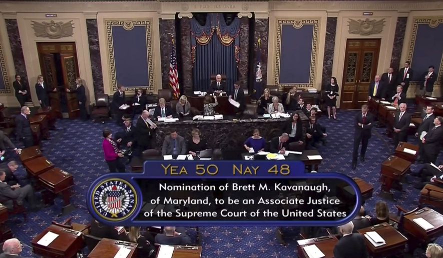 Vice President Mike Pence announces the result of the vote for the confirmation of Brett Kavanaugh to the Supreme Court in Washington. The bitterly polarized U.S. Senate narrowly confirmed Brett Kavanaugh on Saturday to join the Supreme Court, delivering an election-season triumph to President Donald Trump that could swing the court rightward for a generation after a battle that rubbed raw the country's cultural, gender and political divides. (AP Photo/APTN)