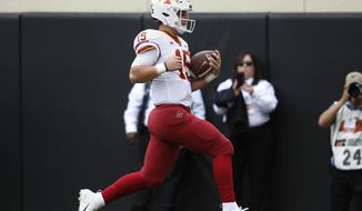 Iowa State quarterback Brock Purdy (15) runs into the end zone with a touchdown in the first half of an NCAA college football game in Stillwater, Okla., Saturday, Oct. 6, 2018. (AP Photo/Sue Ogrocki)