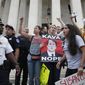 Police move activists as they protest on the steps of the Supreme Court after the confirmation vote of Supreme Court nominee Brett Kavanaugh, on Capitol Hill, Saturday, Oct. 6, 2018 in Washington. (AP Photo/Alex Brandon) **FILE**