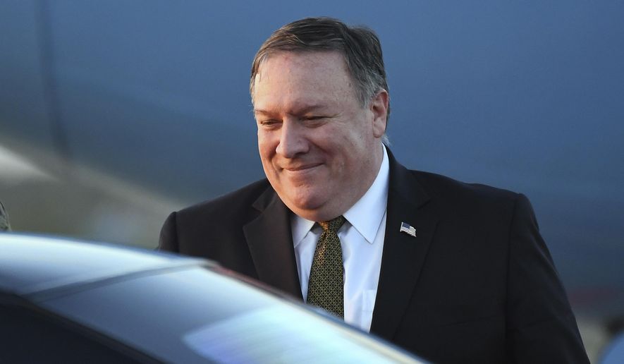 U.S. Secretary of State Mike Pompeo arrives at Osan Air Base in Pyeongtaek, in South Korea, Sunday, Oct. 7, 2018, after his North Korea trip. Pompeo has wrapped up his fourth visit to North Korea after meeting Kim Jong Un to seek elusive progress in efforts to persuade him to give up his nuclear weapons. ( Jung Yeon-je, Pool Photo via AP)