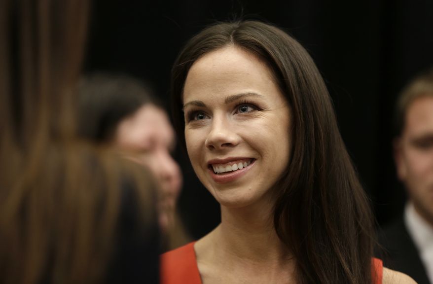 In this Oct. 29, 2014, file photo, former first daughter Barbara Bush talks in Omaha, Neb., before an appearance as feature speaker at the Girls Inc. fundraiser luncheon. Bush married screenwriter Craig Coyne. Her father, former President George W. Bush, escorted his daughter down the aisle while her grandfather, former President George H.W. Bush, watched the ceremony at the family’s Walker Point compound in Kennebunkport, Maine, Sunday, Oct. 7, 2018. (AP Photo/Nati Harnik, File)
