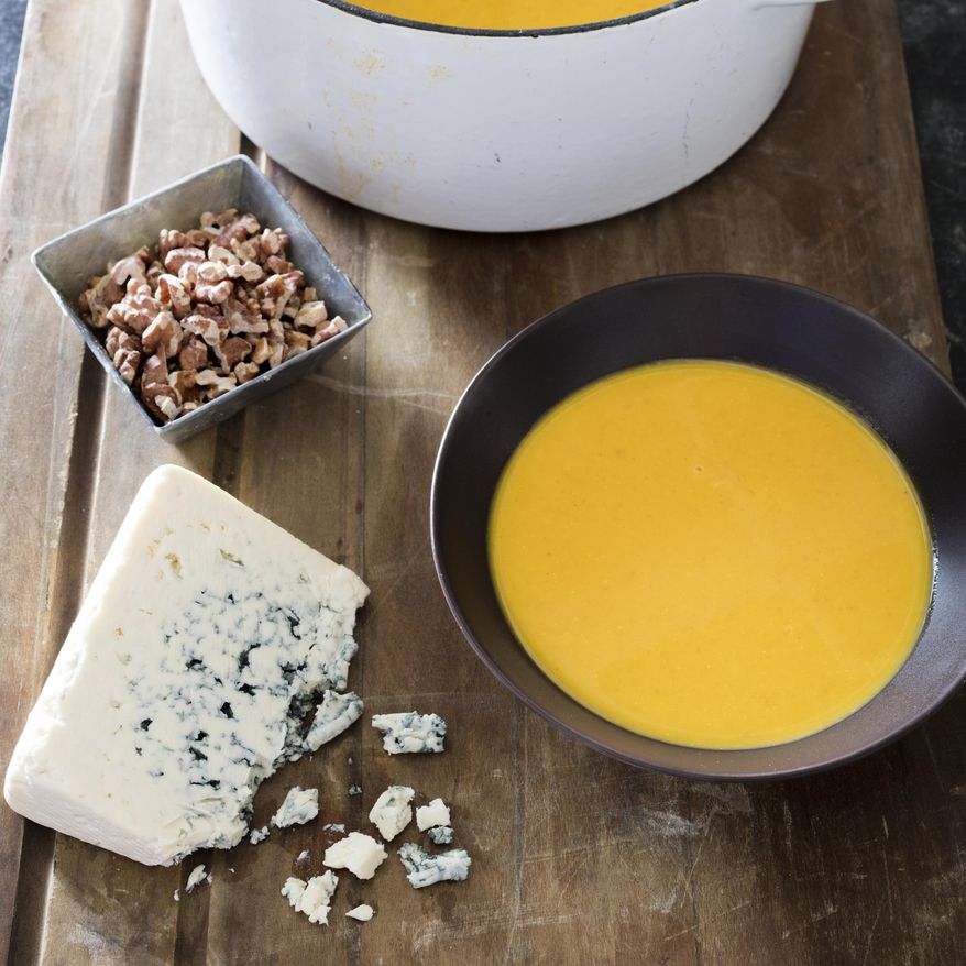 This undated photo provided by America's Test Kitchen in September 2018 shows 11th-hour harvest pumpkin soup in Brookline, Mass. This recipe appears in the cookbook “All-Time Best Soups.” (Daniel J. van Ackere/America's Test Kitchen via AP)
