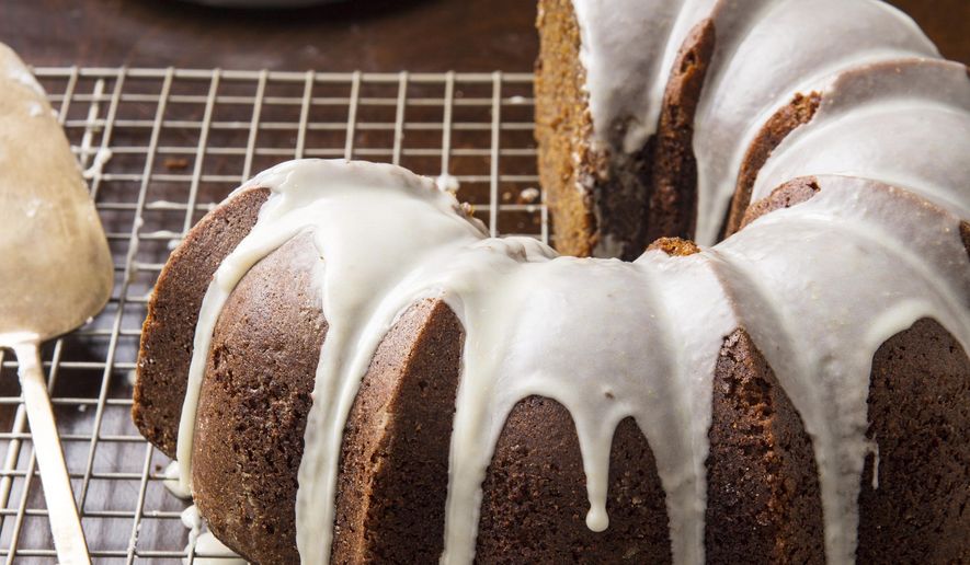 This undated photo provided by America's Test Kitchen in September 2018 shows a bold and spicy gingerbread bundt cake in Brookline, Mass. This recipe appears in the cookbook “The Perfect Cake.” (Joe Keller/America's Test Kitchen via AP)