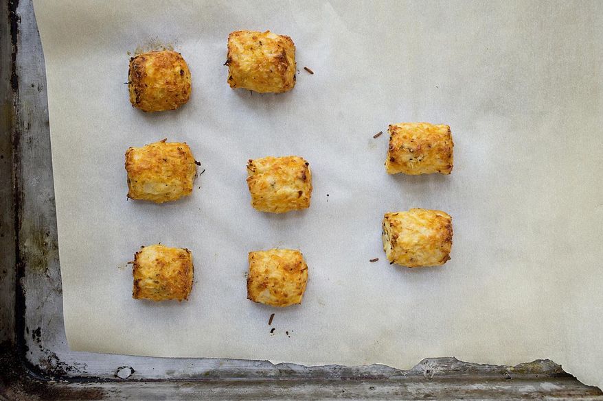 This November 2017 photo shows riced cauliflower tater tots in New York. This dish is from a recipe by Katie Workman. (Lucy Beni via AP)