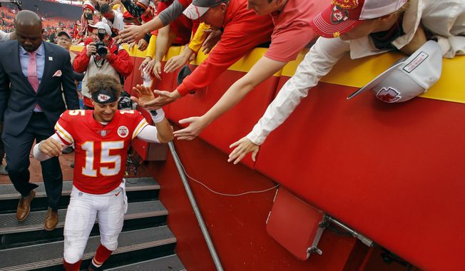 Kansas City Chiefs quarterback Patrick Mahomes greets fans after an NFL football game against the Jacksonville Jaguars, Sunday, Oct. 7, 2018, in Kansas City, Mo. Jackson Mahomes, the younger brother of Patrick Mahomes and not pictured here, is being investigated for two separate reports of assault at a Kansas restaurant last weekend. (AP Photo/Charlie Riedel)