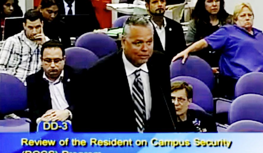 FILE - In this Feb. 18, 2015, file image from video from a Broward County Public Schools meeting school resource officer Scot Peterson addresses the panel. Peterson is scheduled to testify Wednesday. Oct. 10, 2018, during the second day of this month's three-day hearing of the Marjory Stoneman Douglas High School Public Safety Commission. (Broward County Public Schools via AP, File)