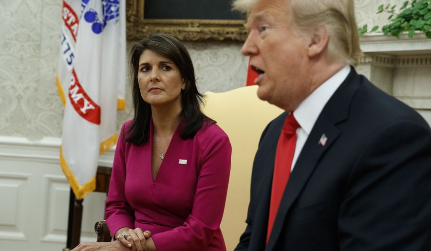 President Donald Trump speaks during a meeting with outgoing U.S. Ambassador to the United Nations Nikki Haley in the Oval Office of the White House, Tuesday, Oct. 9, 2018, in Washington. (AP Photo/Evan Vucci)