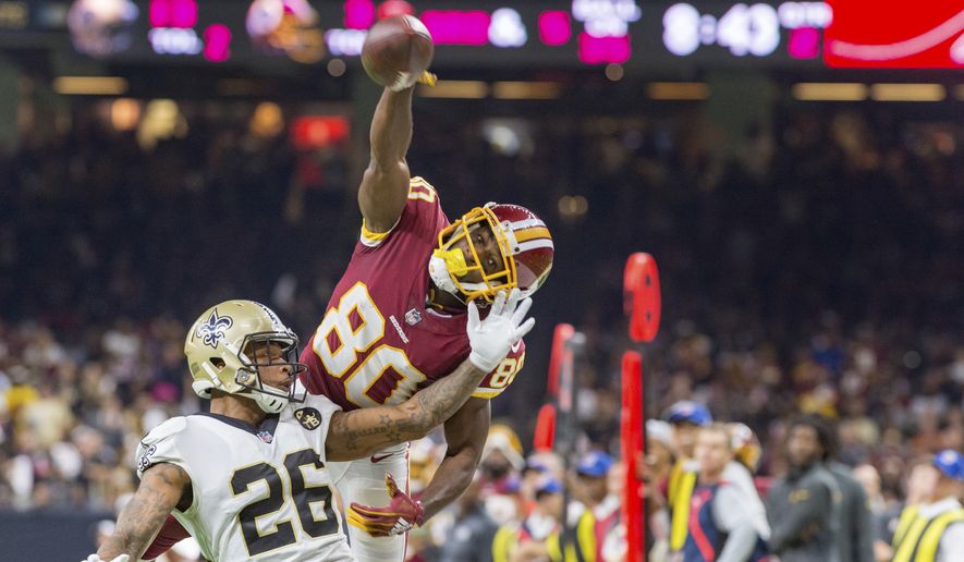 PJ Wiliams breaks up a pass to Redskins receiver Jamison Crowder as the New Orleans Saints take on the Washington Redskins during Monday Night Football at the Mercedes-Benz Superdome, Monday, Oct. 8, 2018. The Saints won 43-19. (The Daily Advertiser via AP)