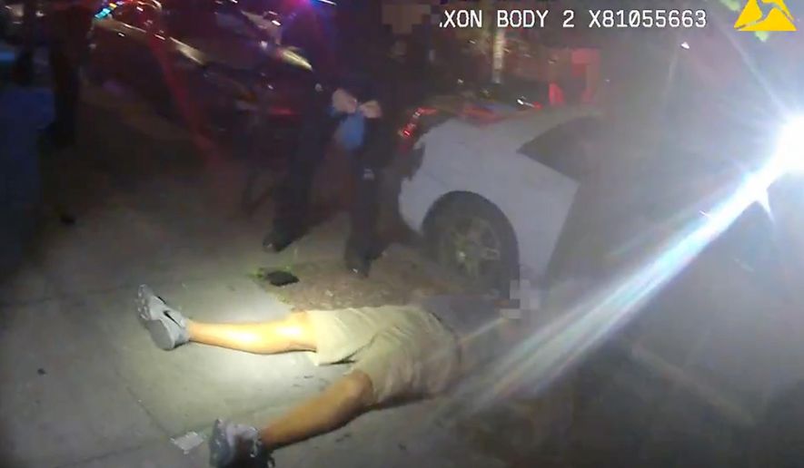 FILE - This June 29, 2018, file video image from a police officer&#x27;s body cam and provided by Portland State University shows Jason Washington after he was shot and killed by Portland State University police officers in Portland, Ore. Grand jury testimony released by a district attorney Tuesday, Oct. 9, into the fatal shooting by university police of a black man during a brawl outside a Portland, Oregon, bar describes a chaotic scene in which the two officers had to make a split-second decision when they saw a pistol in the man&#x27;s hand. (Portland State University via AP, File)