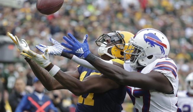FILE - In this Sunday, Sept. 30, 2018, file photo, Buffalo Bills&#x27; Tre&#x27;Davious White breaks up a pass intended for Green Bay Packers&#x27; Davante Adams during the first half of an NFL football game in Green Bay, Wis. On Sunday, White is faced with the daunting challenge of defending DeAndre Hopkins, the NFL&#x27;s leading receiver, in Buffalo&#x27;s game at the Houston Texans. (AP Photo/Morry Gash, File)