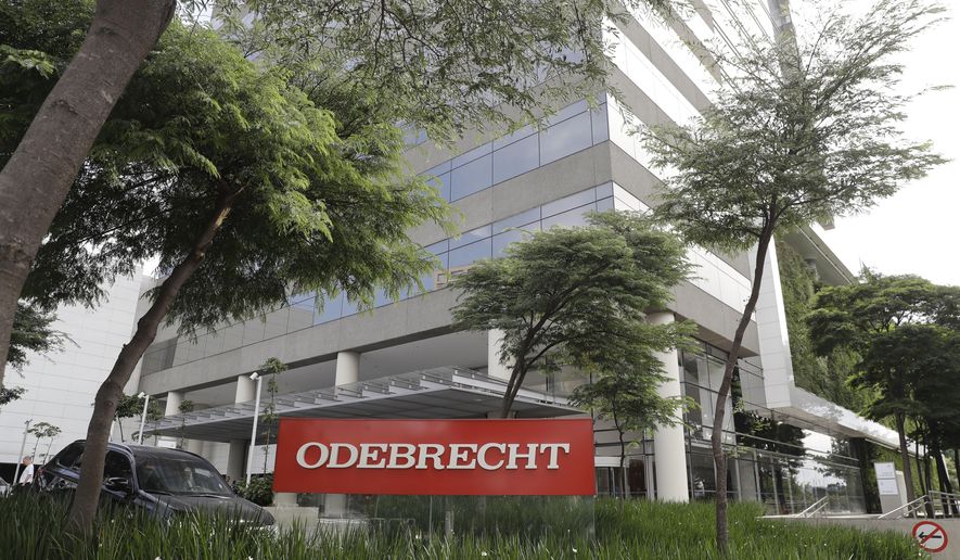 FILE - This April 12, 2018 file photo, shows the Odebrecht headquarters in Sao Paulo, Brazil. Brazilian prosecutors say evidence that could shed light on bribes paid in Mexico by construction giant Odebrecht has been held up because Mexican prosecutors have refused to sign off on terms for exchanging information. (AP Photo/Andre Penner, File)