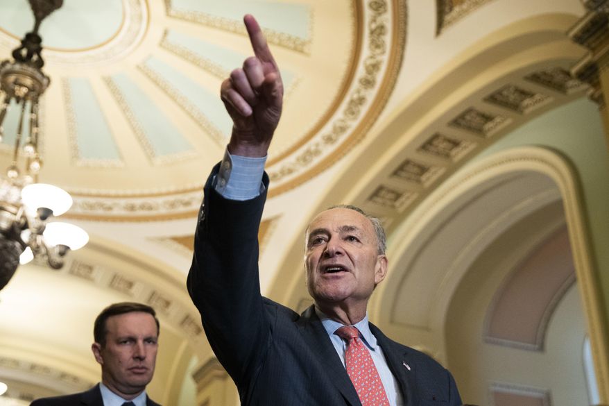 Senate Minority Leader Chuck Schumer of N.Y., points to a reporter as he speaks to media after the Democratic policy luncheon on Capitol Hill, Wednesday, Oct. 10, 2018, in Washington. (AP Photo/Alex Brandon) ** FILE **