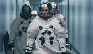 This image released by Universal Pictures shows Ryan Gosling in a scene from &amp;quot;First Man.&amp;quot; (Daniel McFadden/Universal Pictures via AP)