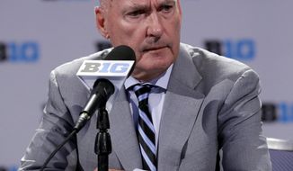Big Ten Commissioner Jim Delany listens to a question at a press conference during Big Ten NCAA college basketball media day Thursday, Oct. 11, 2018, in Rosemont, Ill. (AP Photo/Nam Y. Huh)